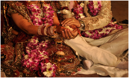 Close-up shot of the bride and groom at a Punjabi wedding